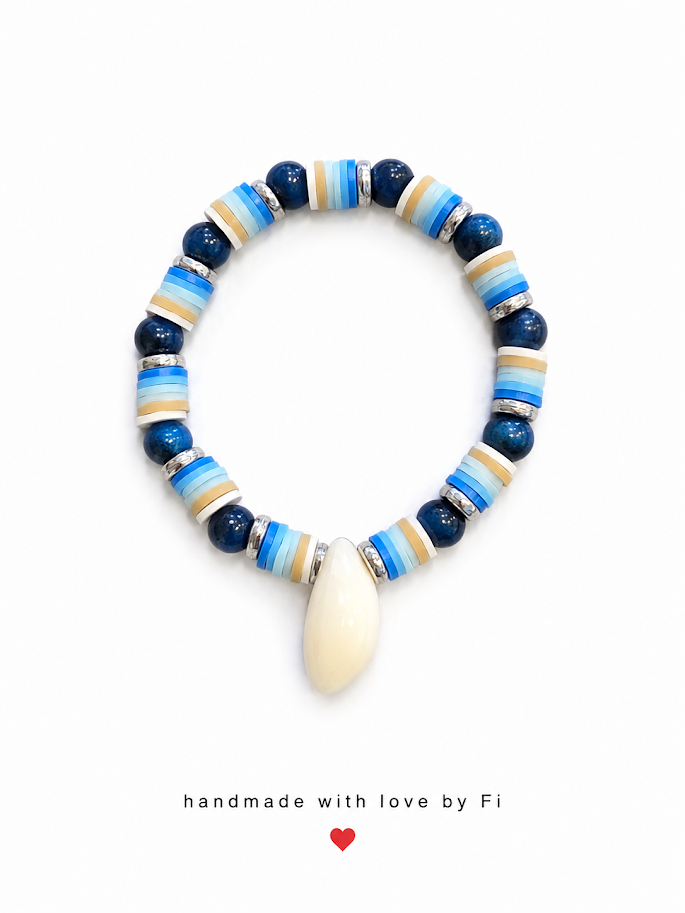 Navy blue and striped clay heishi disc bracelet with cowrie shell drop and rhinestone spacers handmade by Fi