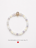 Lavender and white cat's eye cube bracelet with champagne crystal focal bead handmade by Fi