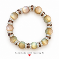 Pastel shimmer beaded bracelet with smoky brown faceted beads and sparkling silver-tone spacers