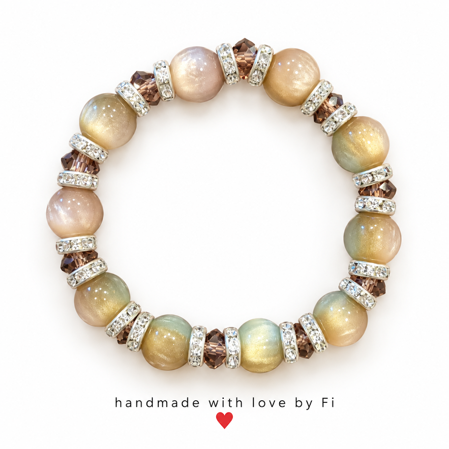 Pastel shimmer beaded bracelet with smoky brown faceted beads and sparkling silver-tone spacers