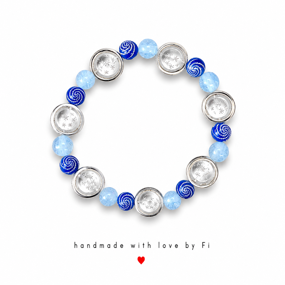 Blue swirl and star bead stretch bracelet handmade by Fi