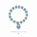 Cornflower blue and champagne crystal rondelle bracelet with glass globe dried flower charm handmade by Fi