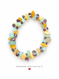 Handmade bracelet with mint green, yellow, amber and smoky purple chip beads