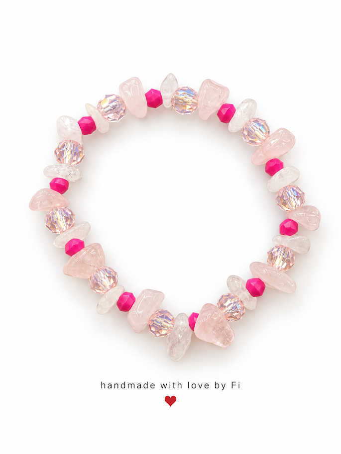 Pale pink and white chip bead bracelet with bright pink accents and shimmering pale pink faceted beads