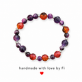 Purple and burnt orange crackle bead bracelet with silver spacers handmade by Fi