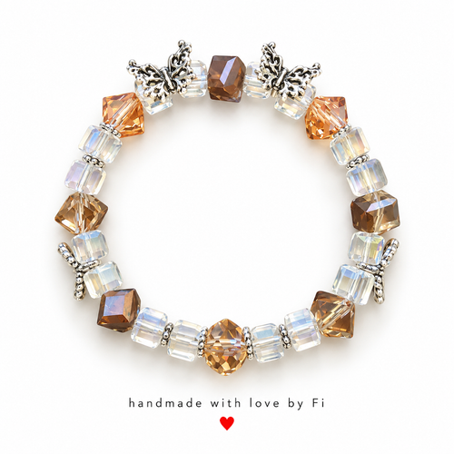Amber and clear faceted beaded bracelet with silver-tone butterfly accents