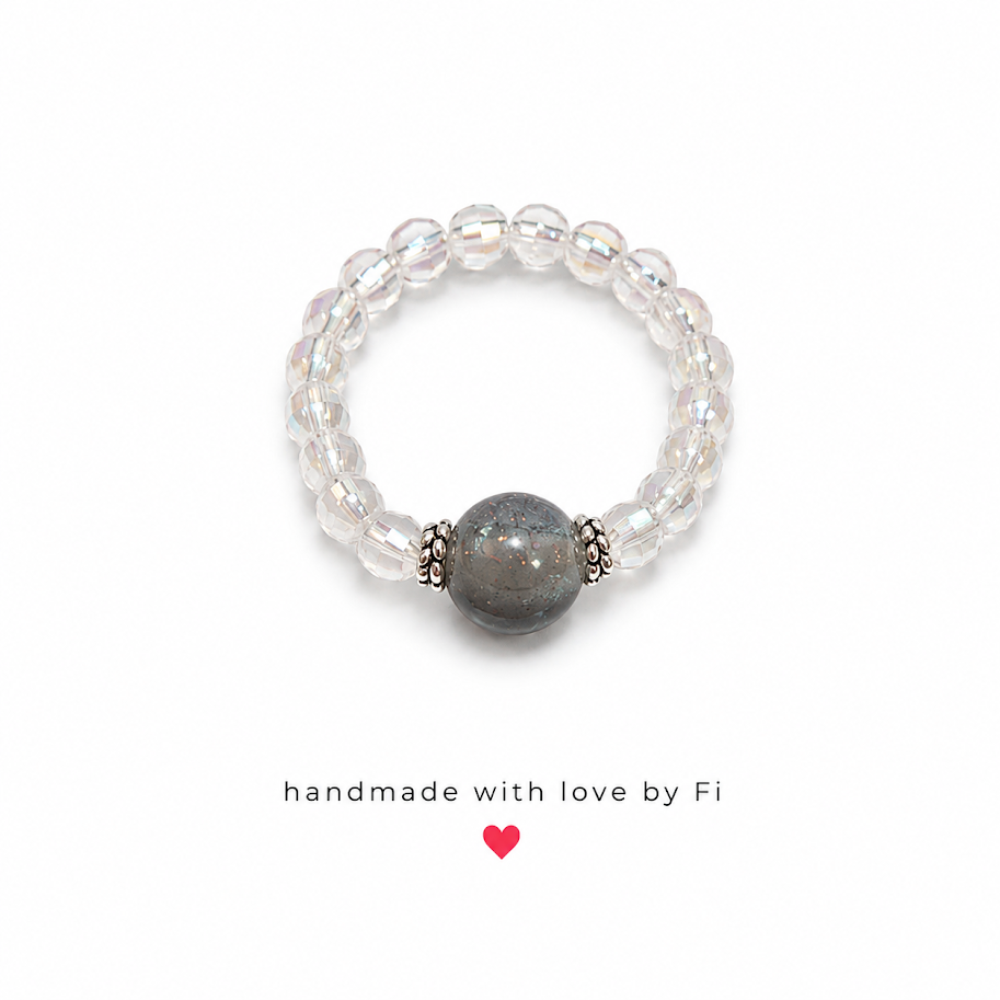 Crystal and labradorite stretch ring with silver spacers handmade by Fi