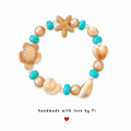 Beachy sea turtle and starfish bracelet with turquoise, shell and wood beads handmade by Fi