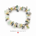 Mint green, pale blush and black-veined chip-style beads with gold-tone spacers