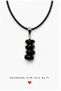 Black onyx chip pendant necklace on black leather cord handmade by Fi