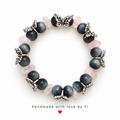 Dark round and pale pink chip beaded bracelet with silver-tone butterflies