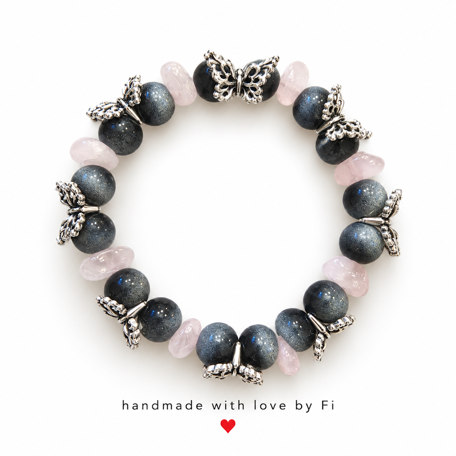 Dark round and pale pink chip beaded bracelet with silver-tone butterflies