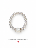 Grey crystal and moonstone oval centrepiece stretch ring with silver filigree caps handmade by Fi