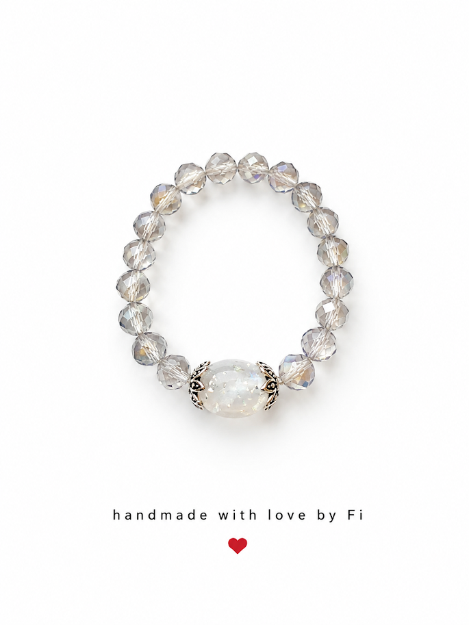 Grey crystal and moonstone oval centrepiece stretch ring with silver filigree caps handmade by Fi